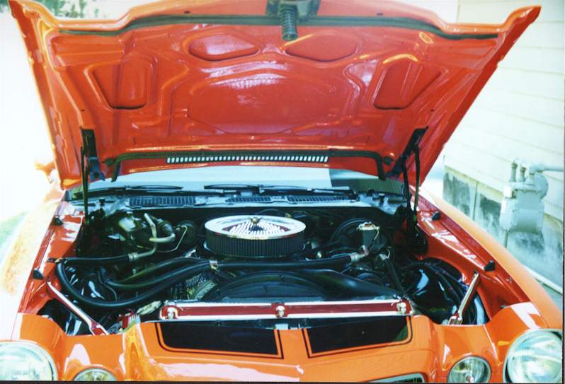 Engine installed and hood underside painted orange